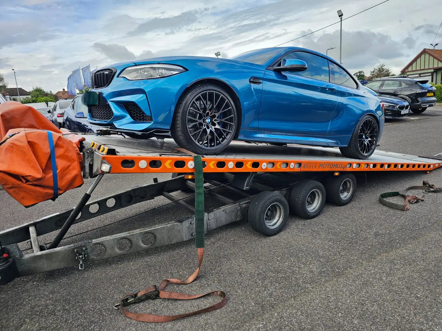 BMW recovered onto a flatbed truck in Basildon, Essex