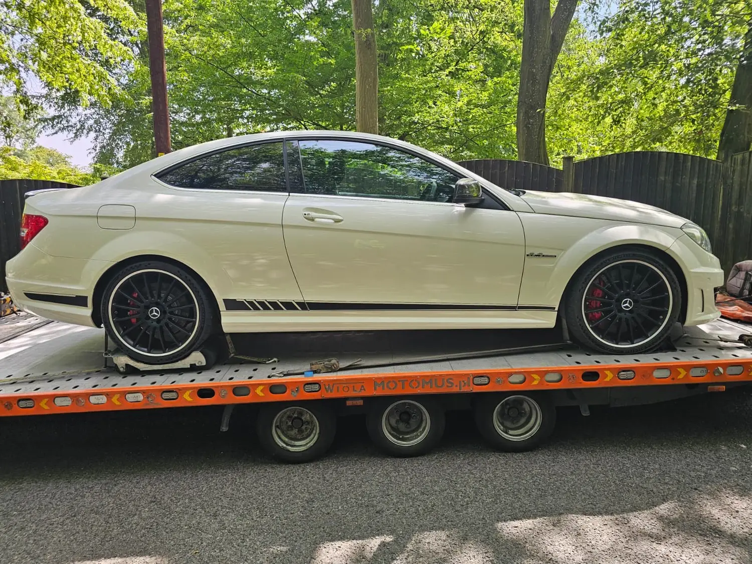 Mercedes C63 AMG coupe transported on a flatbed in Brentwood, Essex