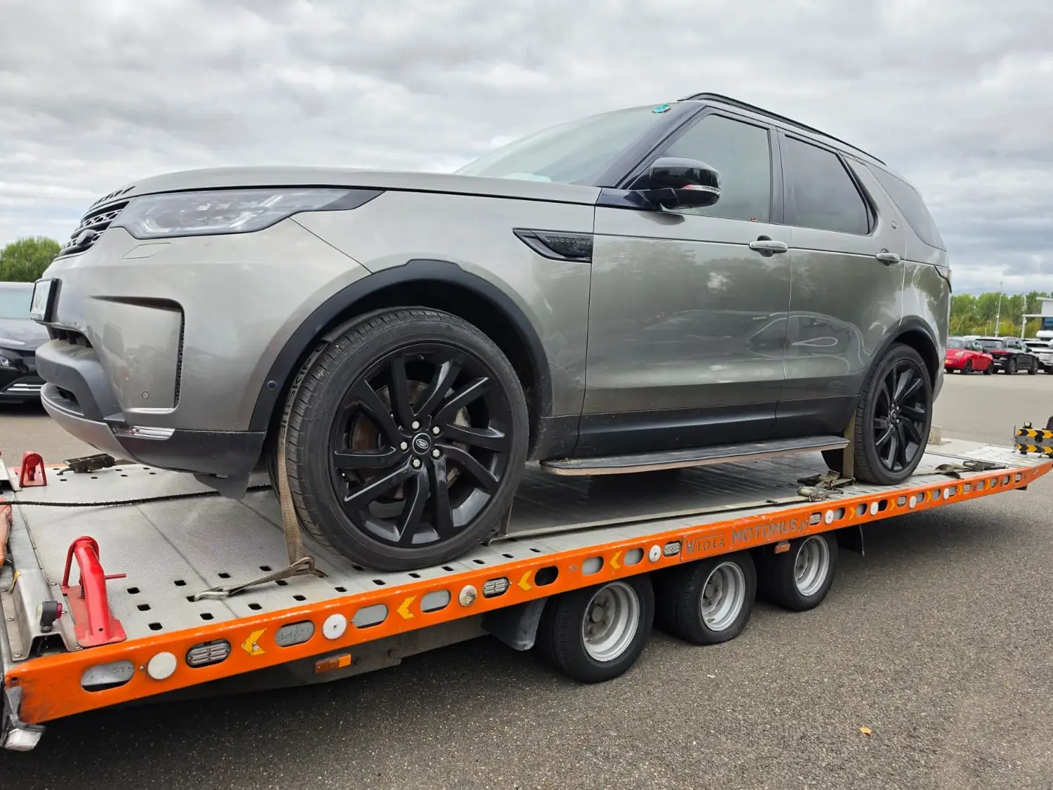 Land Rover Discovery loaded on an Essex Breakdown Recovery flatbed truck