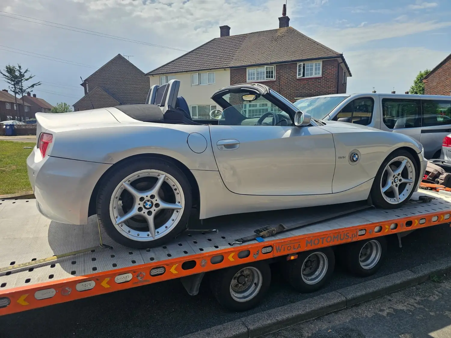 BMW Z4 convertible on a flatbed transporter, vehicle transport service in Essex