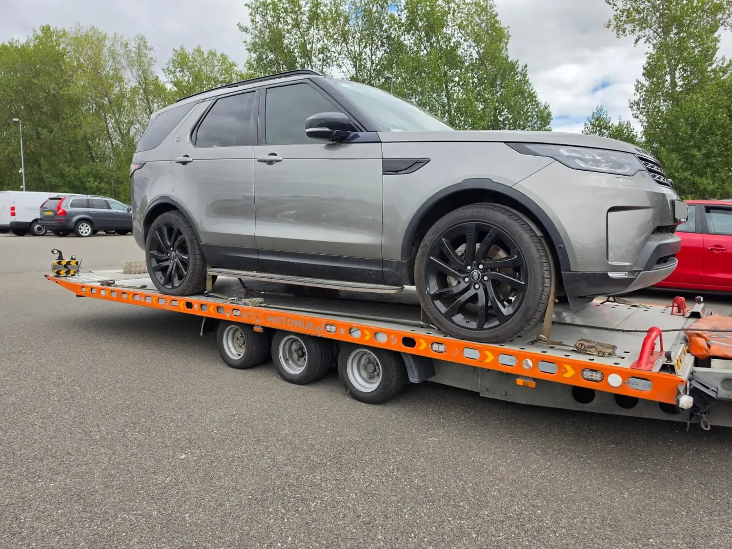 Land Rover Discovery on a flatbed recovery truck in South Ockendon