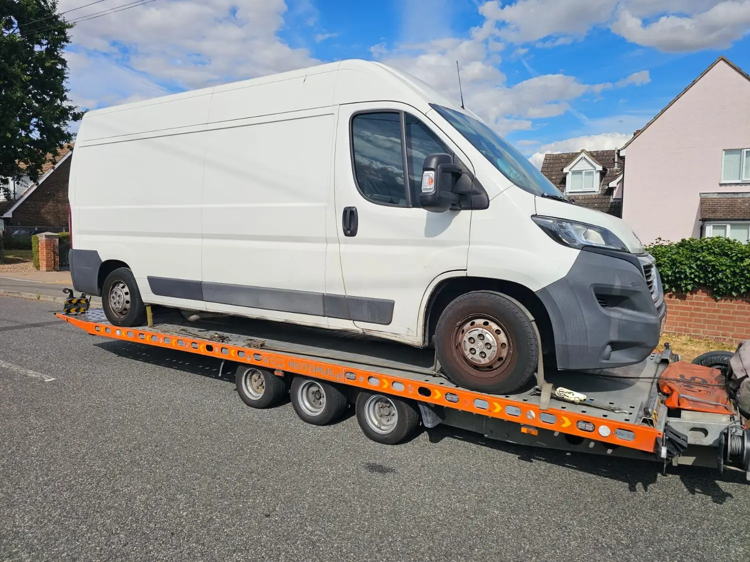 Panel van loaded on an Essex Breakdown Recovery flatbed in Tilbury